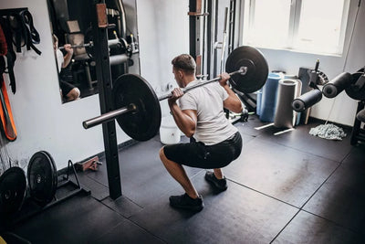 Lower Back Pain from Squats: Causes, Solutions, and More