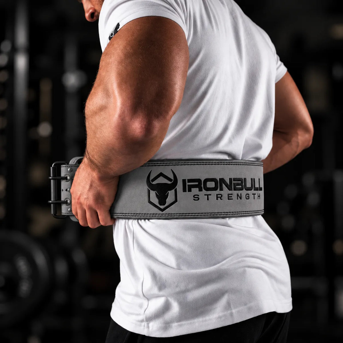 #color_grey | Lifter wearing Iron Bull Strength double prong lifting belt during a workout