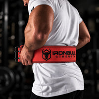 #color_red | Lifter wearing Iron Bull Strength double prong lifting belt during a workout
