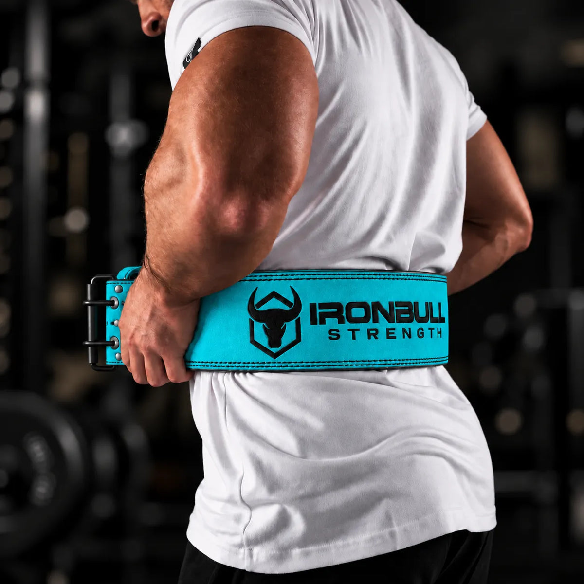 #color_olympic-blue | Lifter wearing Iron Bull Strength double prong lifting belt during a workout