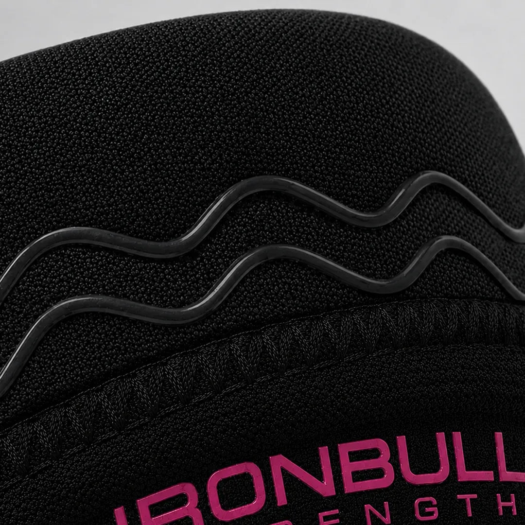 #color_black-pink | Close-up of anti-slip feature on Iron Bull Strength 7mm knee sleeves
