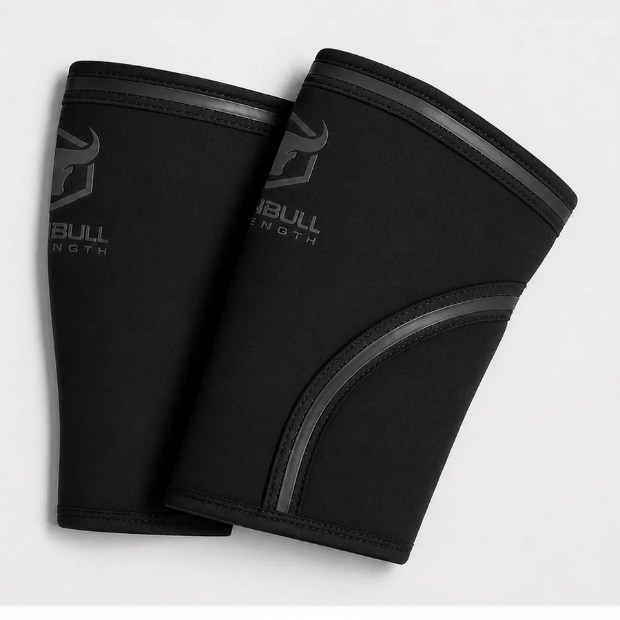 #color_black | Black Iron Bull Strength 7mm knee sleeves showing compression fit