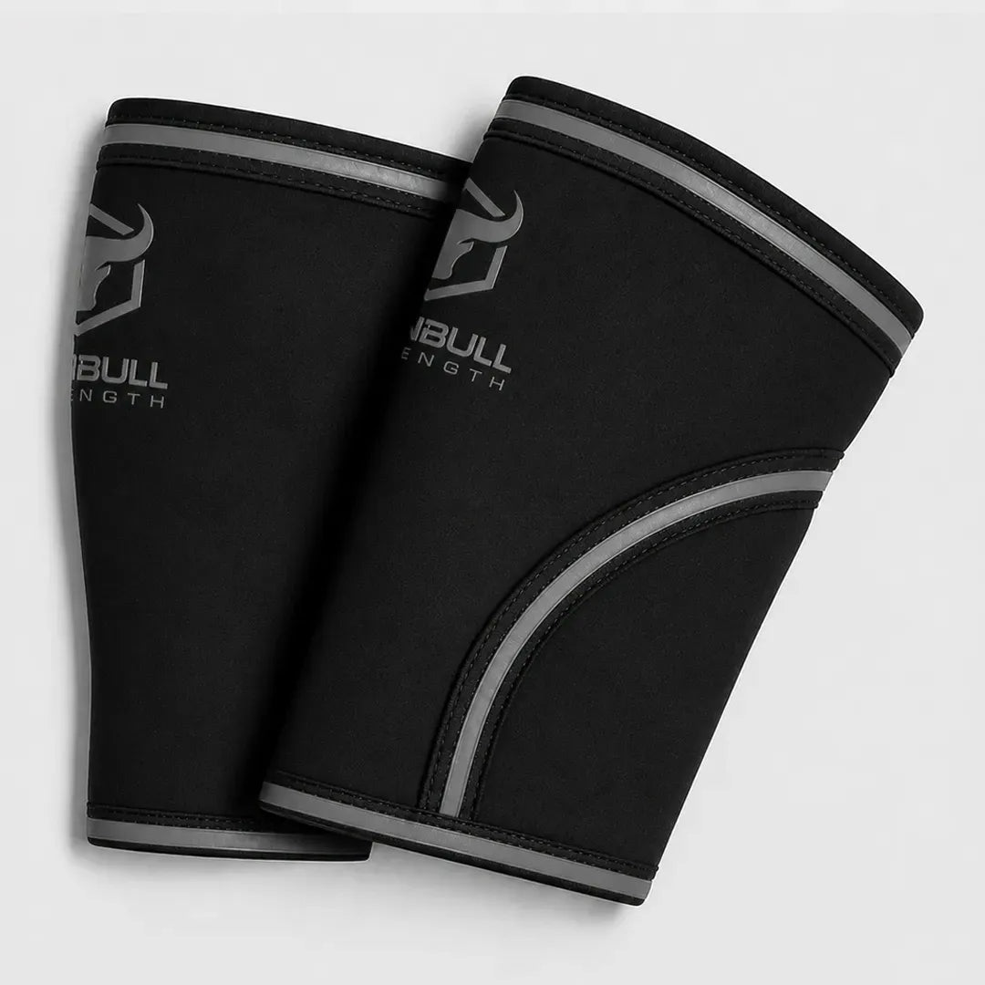 #color_black-gray | Black Iron Bull Strength 7mm knee sleeves showing compression fit
