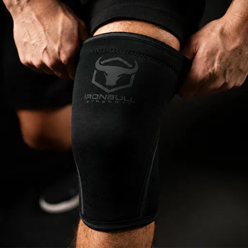 #color_black | Iron Bull Strength 7mm knee sleeves for squats in black, how to wear